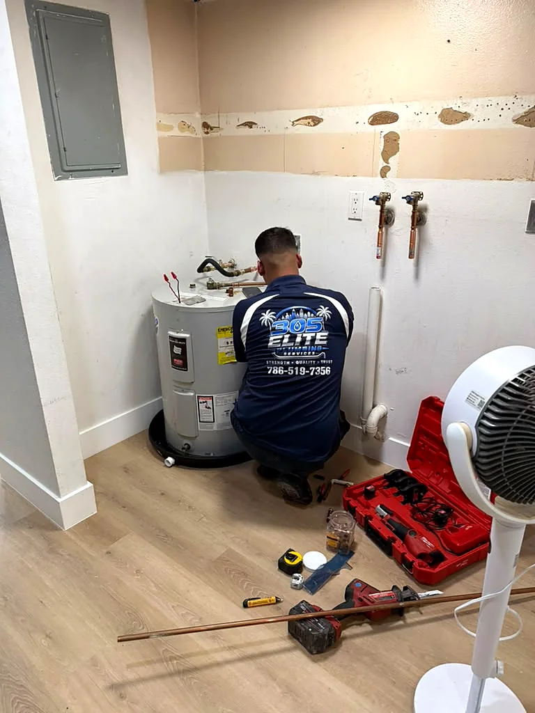 Water heater replacement in a laundry room in Miami by 305 Elite Plumbing